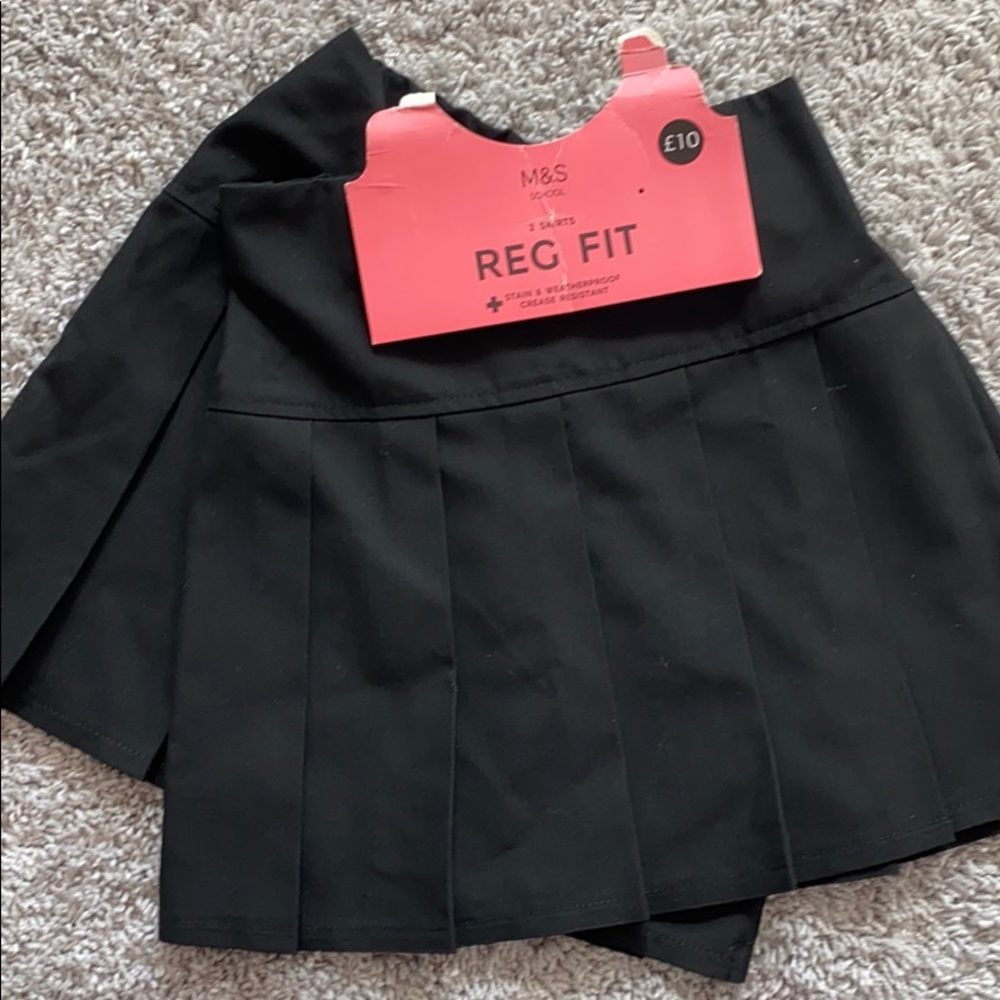 Marks and Spencer’s set of 2 uniform skirts